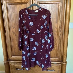 Long sleeve, mini, floral burgundy dress. Sheer sleeves, zippered back. Worn 1x